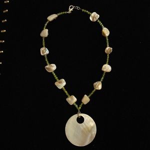 Shell beaded necklace with shell pendant green beads
